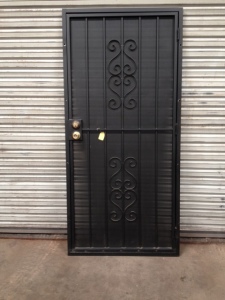 outside frame measures 38 " x 81" Black scroll design (#103 in our catalog). Door is sold 'AS IS' for $300.00, more than 50% off.