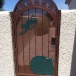 side gate with green designs on screen door image