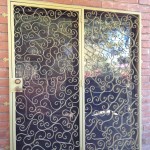 yellow spiral design double screen door image