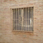 metal tan window guard with design image