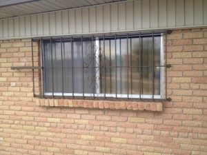 metal window guard with design image